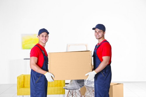House movers working in a Bishopsgate apartment building entrance