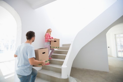 Office furniture and workstations being moved in a central London commercial building